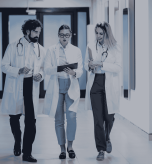 A group of physicians in a clinical setting, illustrating the strategic value of a Clinical Observership program from ARCAS Education.