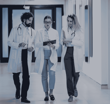 A group of physicians in a clinical setting, illustrating the strategic value of a Clinical Observership program from ARCAS Education.