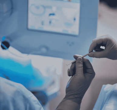 A physician taking structured notes while observing a senior specialist, illustrating the key principles of a successful clinical observership.