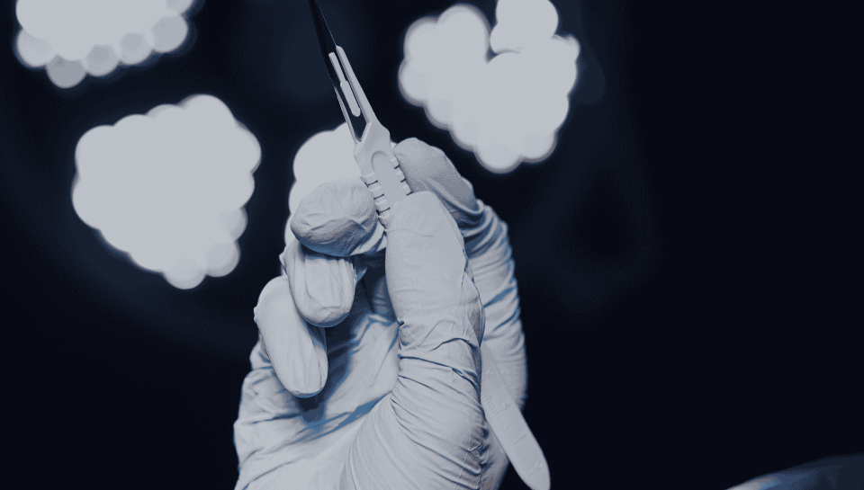 A surgeon gaining tactile experience in a hands-on fresh frozen cadaver course, the gold standard in advanced surgical training.